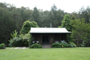 Romantic Timber Cabin, set in the forest beside a crystal clear watercourse, Bellbrook